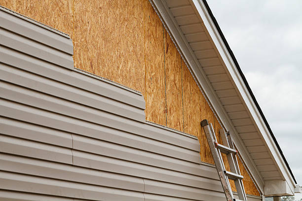 Professional Siding Contractor technician working in Rochester, IN